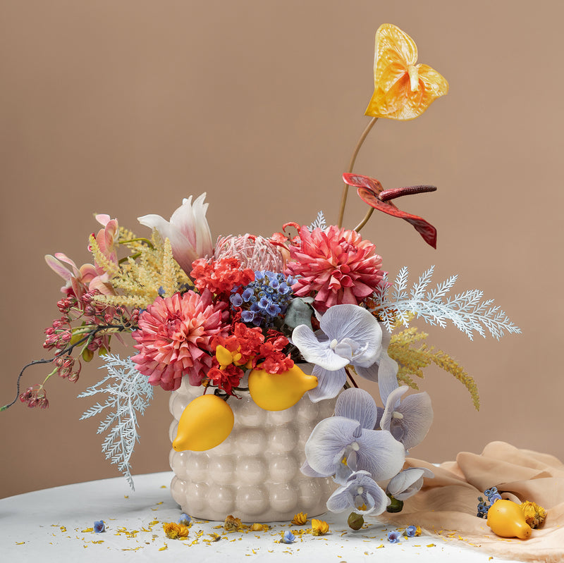 Vibrant Faux Dahlia and Anthurium Arrangement in Textured White Vase - Bold Colors and Lifelike Detail