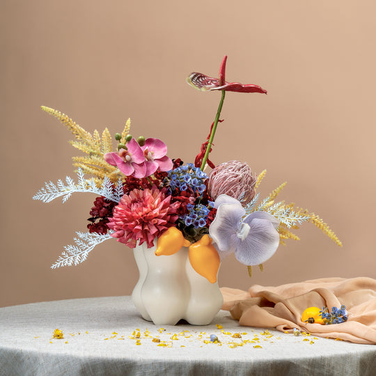 Vibrant Faux Dahlia and Anthurium Arrangement in Textured White Vase - Bold Colors and Lifelike Detail