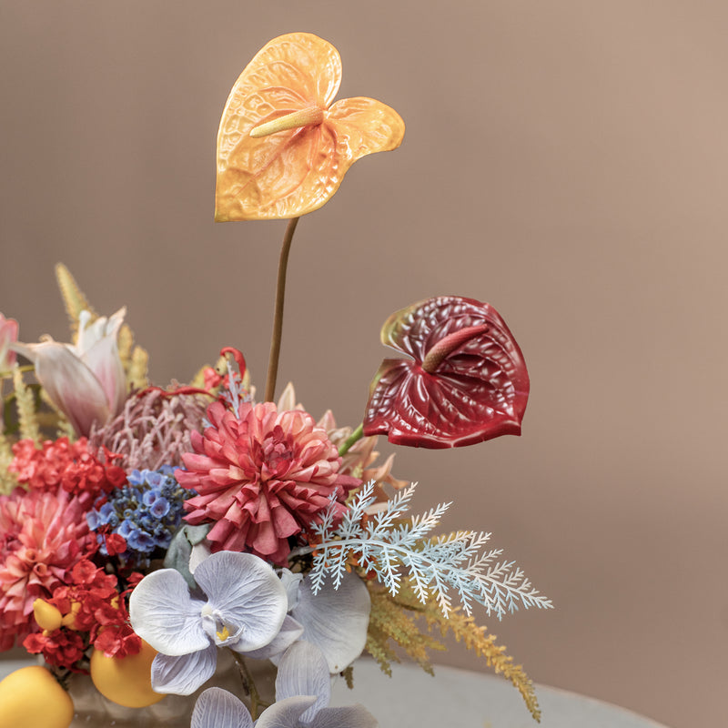 Vibrant Faux Dahlia and Anthurium Arrangement in Textured White Vase - Bold Colors and Lifelike Detail