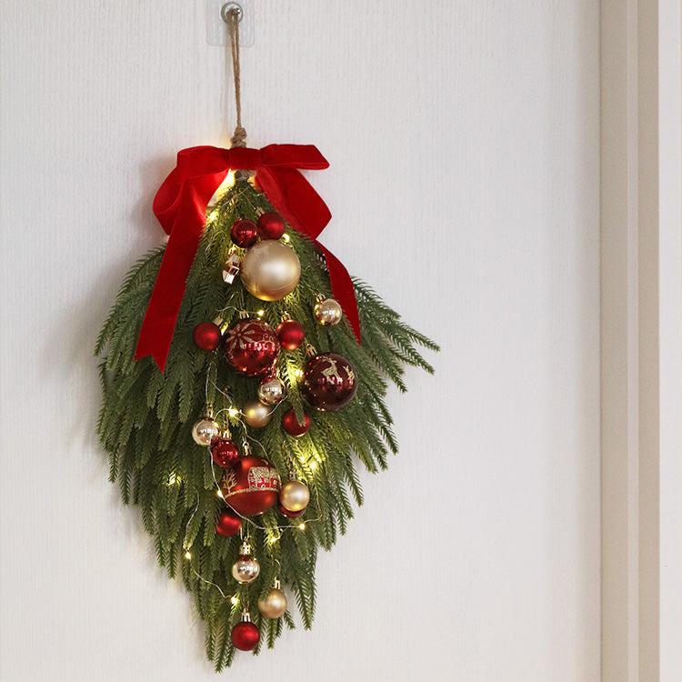 Festive Faux Pine Christmas Teardrop Swag with Red Ribbon and Ornaments - Cheerful and Inviting