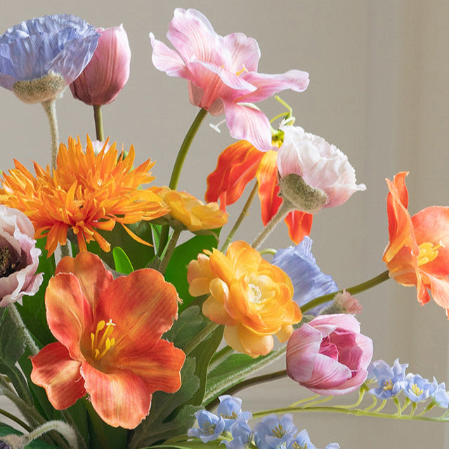 Cheerful Faux Tulips and Mixed Spring Flowers Arrangement in White Ceramic Vase - Bright Colors and Realistic Texture