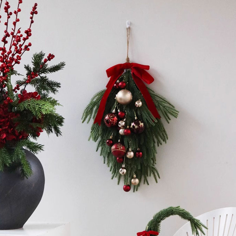 Festive Faux Pine Christmas Teardrop Swag with Red Ribbon and Ornaments - Cheerful and Inviting